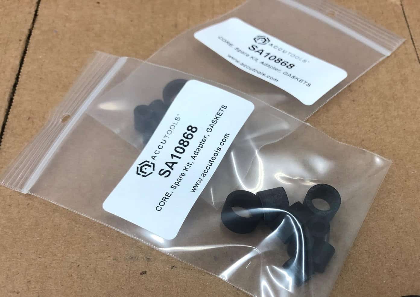 A package of Accutools SA10868-1 replacement gaskets for TruBlu Hi-Flow adapters, showing multiple small, durable rubber O-rings designed for sealing vacuum and refrigerant connections.