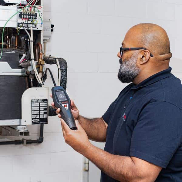 Bosch CS-LD1.0 Leak Detector, a professional handheld electronic device for detecting refrigerant leaks in HVAC/R systems, featuring a flexible probe and clear display.