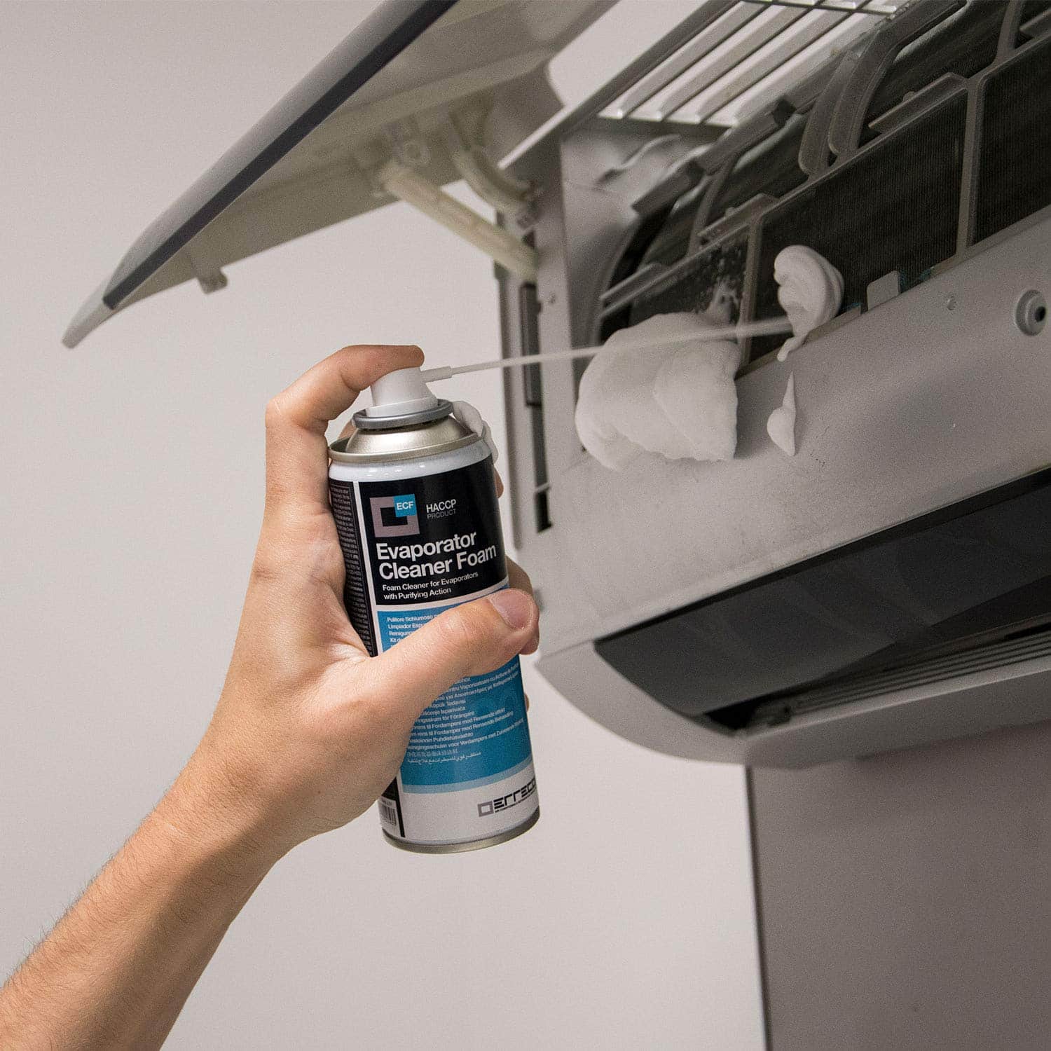 A can of Errecom AB1049.J.01 Foam Cleaner For A/C System, showing the product label with a foaming action graphic, highlighting its cleaning power.