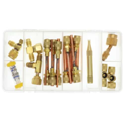 C&D Valve CD9510SVK Access Fitting Service Kit, displaying an assortment of replacement valve cores, caps, and service valves for HVAC/R systems.